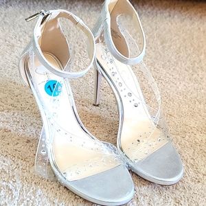 Women's Jessica Simpsons strappy heels.